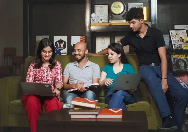 Lollypop’s design team collaborating around a table